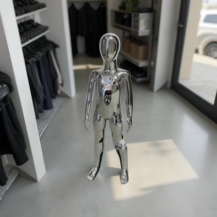 Maniquí de niño cromado plateado de importación